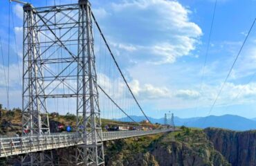 Royal gorge bridge view with clouds in the back.